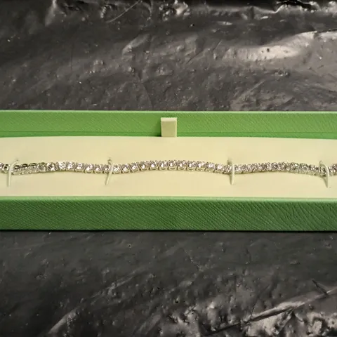 SWAROVSKI BRACELET WITH CLEAR STONES IN SILVER TONE
