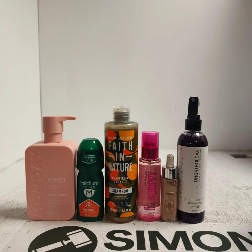 APPROXIMATELY 15 ASSORTED BEAUTY PRODUCTS INCLUDING UNORTHOLOXX TEXTURE SPRAY, L'OREAL PLUMPING TINTED SERUM AND MAYBELINE SETTING MIST