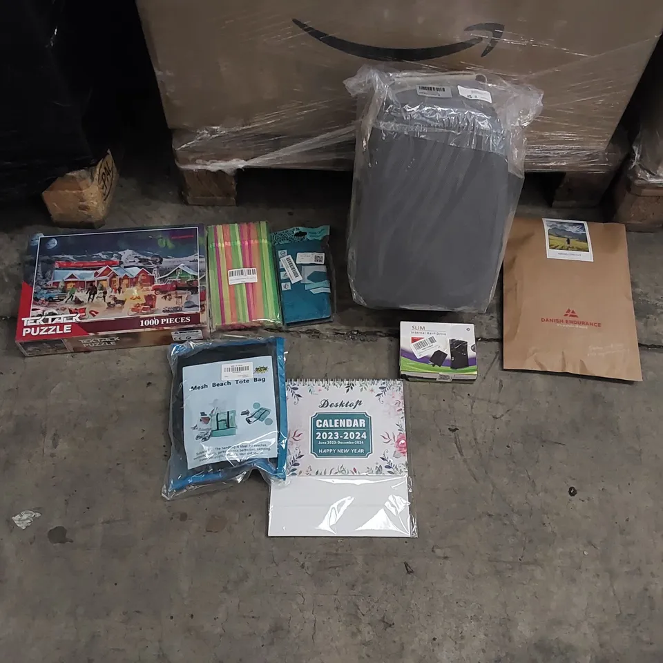 PALLET OF ASSORTED ITEMS INCLUDING: SMALL SUITCASE, HIKING SOCKS, HARD DRIVE, PHONE CASE, CALANDER, STRAWS, PUZZLES,  BEACH BAG