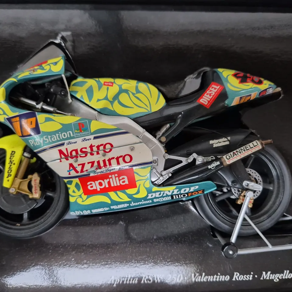 MINICHAMPS 1:12 SCALE APRILIA RSW 250CCM - VALENTINO ROSSI - MUGELLO GP 1999 MODEL