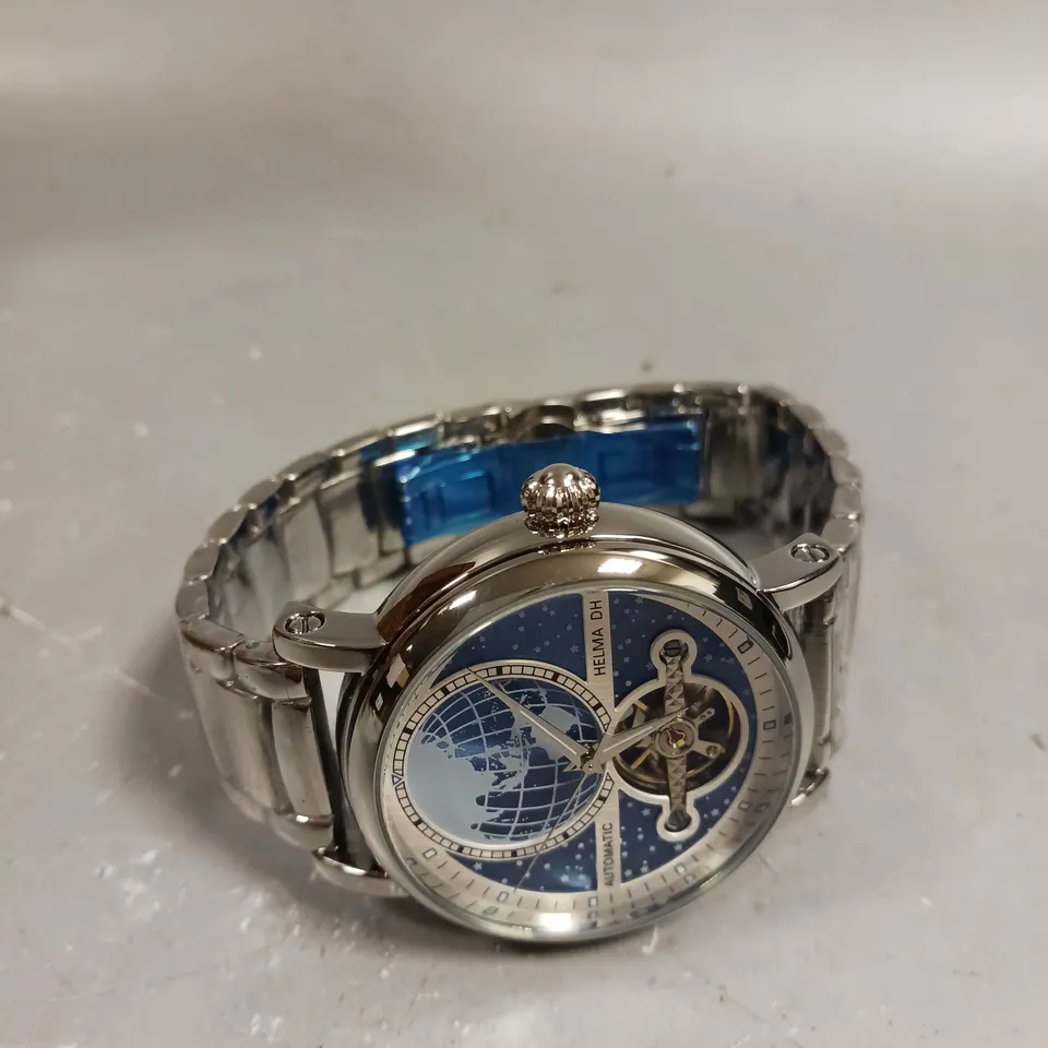 MEN’S HELMA DH AUTOMATIC WORLD VIEW WATCH – TOURBILLON MOVEMENT – BLUE DIAL – STAINLESS STEEL STRAP – GLASS EXHIBITION BACK CASE