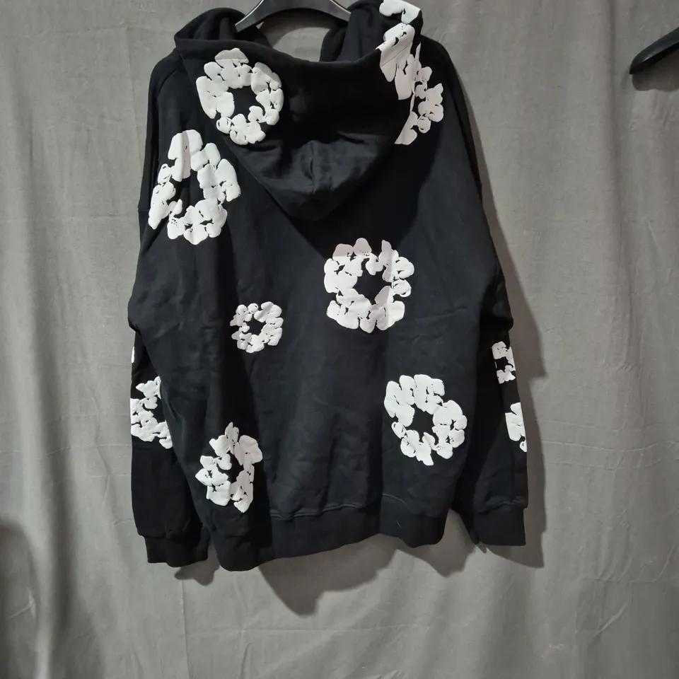 DENIM TEARS X AFRICAN DIASPORA GOODS HOODIE – BLACK ZIP HOODIE WITH WHITE FLORAL PRINT