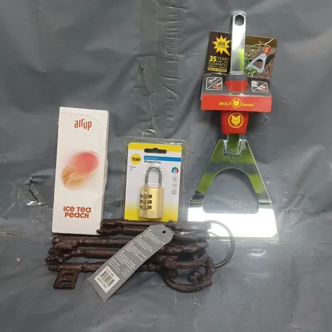 APPROXIMATELY 10 ASSORTED HOUSEHOLD ITEMS TO INCLUDE AIR UP AROMA PODS, YALE COMBINATION PADLOCK, ETC