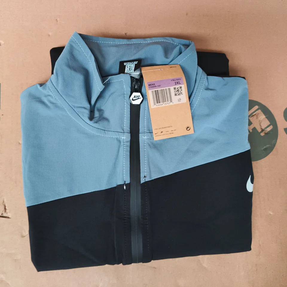 nike long sleeve zip-up jacket in black/grey size 2xl
