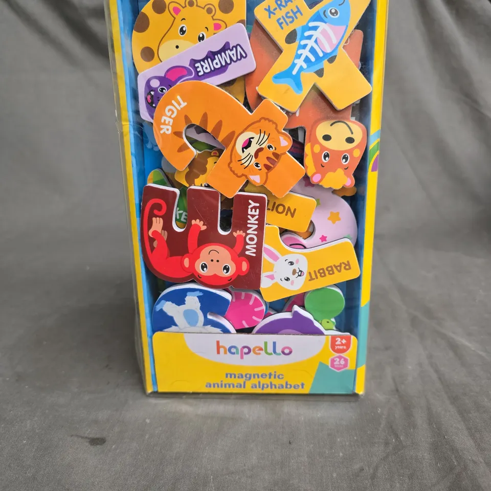 CAGE CONTAINING A LARGE QUANTITY OF KIDS TOYS AND GAMES TO INCLUDE BEST EVER DOUGH ART, KIDS KITCHEN SINK AND DISHES SET, H2O GO! DOUBLE SLIDE, HAPELLO MAGNETIC ANIMAL ALPHABET, HELLO KITTY PLUSH TOY 