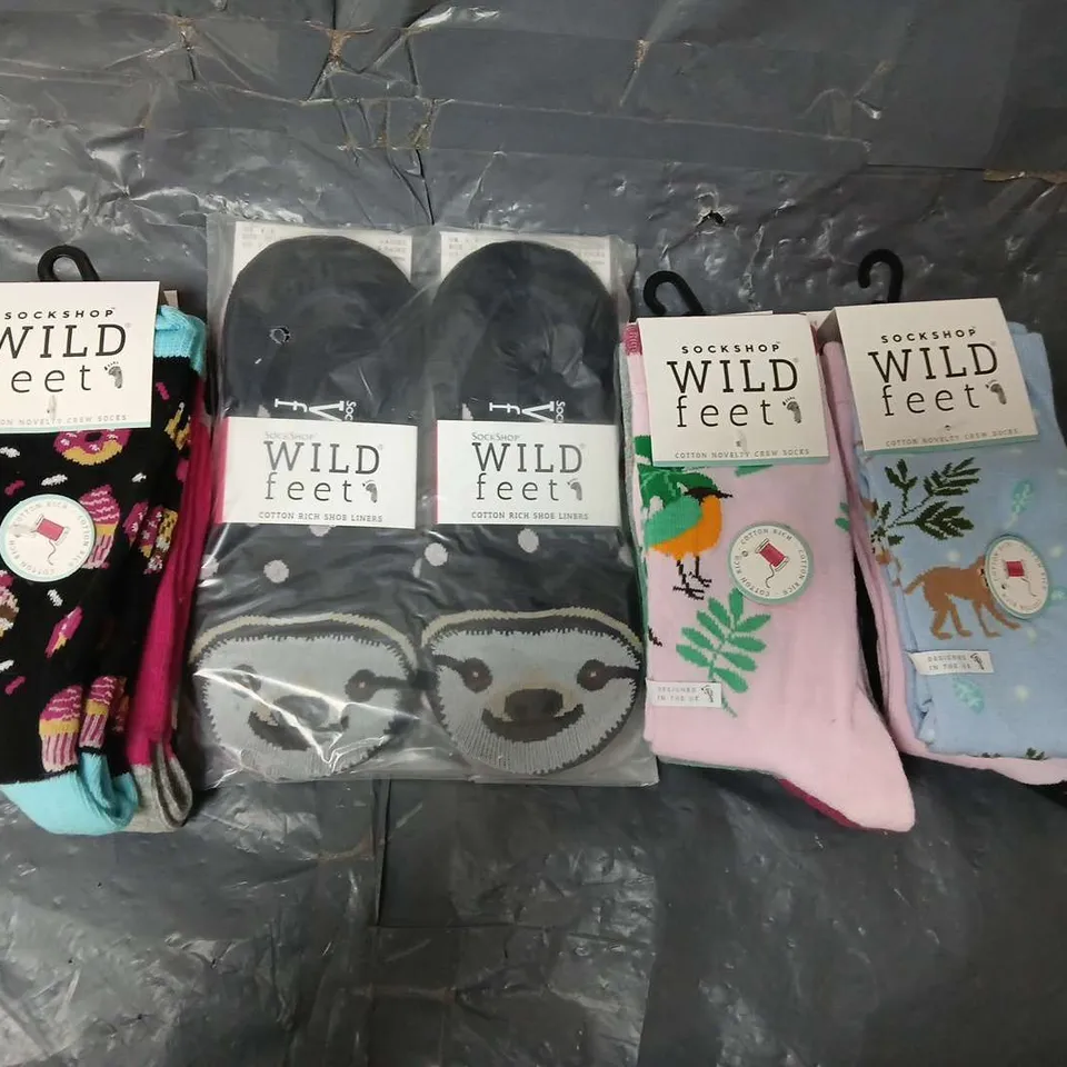 APPROXIMATELY 25 ASSORTED PACKS OF WILD FEET LADIES SOCKS IN VARIOUS COLOURS, STYLES AND SIZES