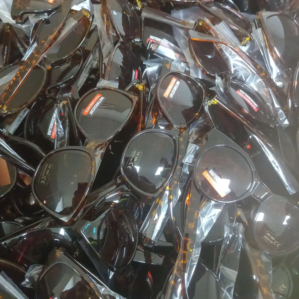 BOX OF APROX 100 SUN GLASSES IN VERSUS DESIGN AND COLOR