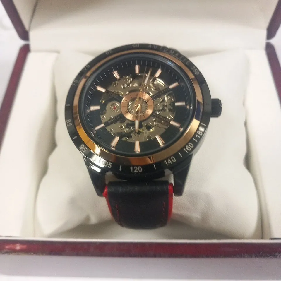 MEN’S STOCKWELL AUTOMATIC SPORTS WATCH, SKELETON DIAL, BLACK LEATHER STRAP WITH RED DETAILING. 