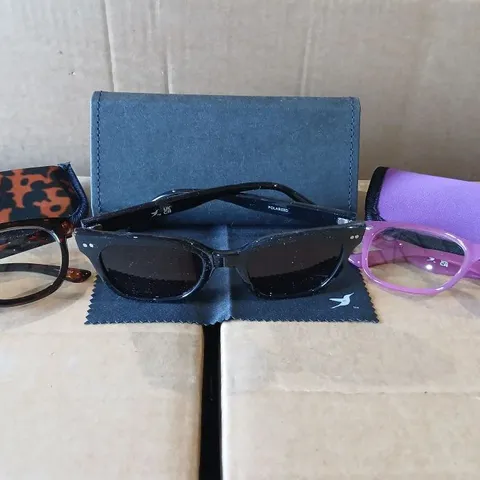 PALLET OF APPROXIMATELY 247 HUMMINGBIRD SUNGLASSES & READERS SET – BLACK POLARISED SUNGLASSES + 2 READING GLASSES (BROWN TORT & RASPBERRY RADIANCE) WITH CASE, POUCHES & CLOTH 