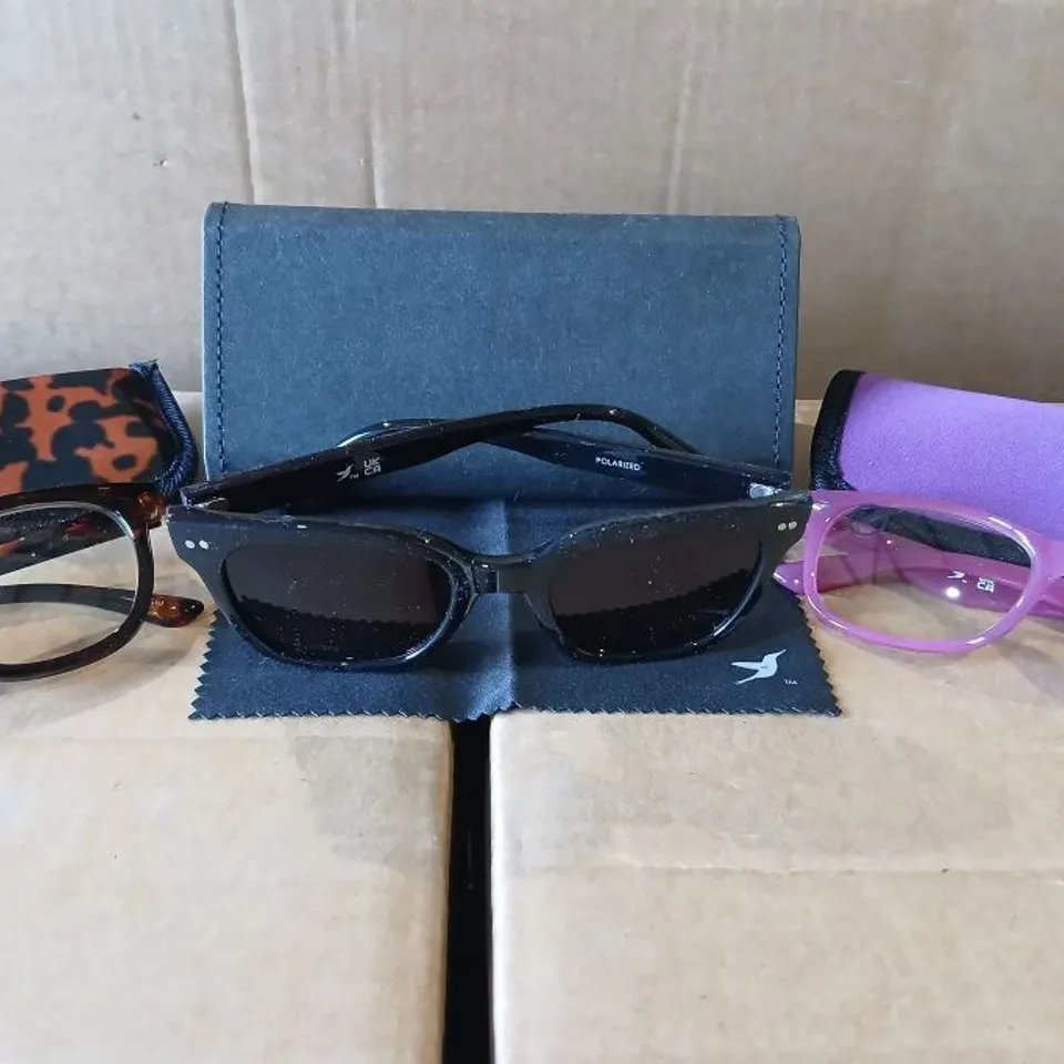 PALLET OF APPROXIMATELY 247 HUMMINGBIRD SUNGLASSES & READERS SET – BLACK POLARISED SUNGLASSES + 2 READING GLASSES (BROWN TORT & RASPBERRY RADIANCE) WITH CASE, POUCHES & CLOTH 
