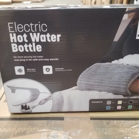 BOX CONTAINING 4 KEPLIN ELECTRIC HOT WATER BOTTLE - GREY