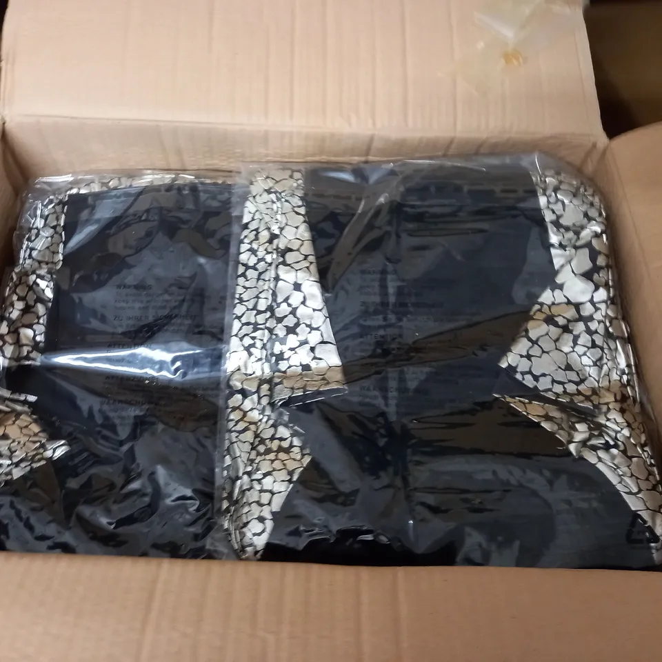LOT OF APPROXIMATELY 20 BAGGED RONNIE TOP AND SKIRT SETS - SIZE UNSPECIFIED