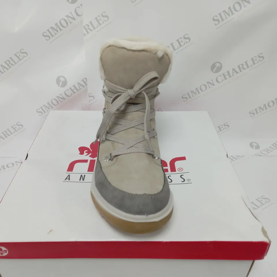 BOXED PAIR OF RIEKER ANTISTRESS WATER RESISTANT WARM HIKING BOOTS, CREAM - SIZE 6.5 