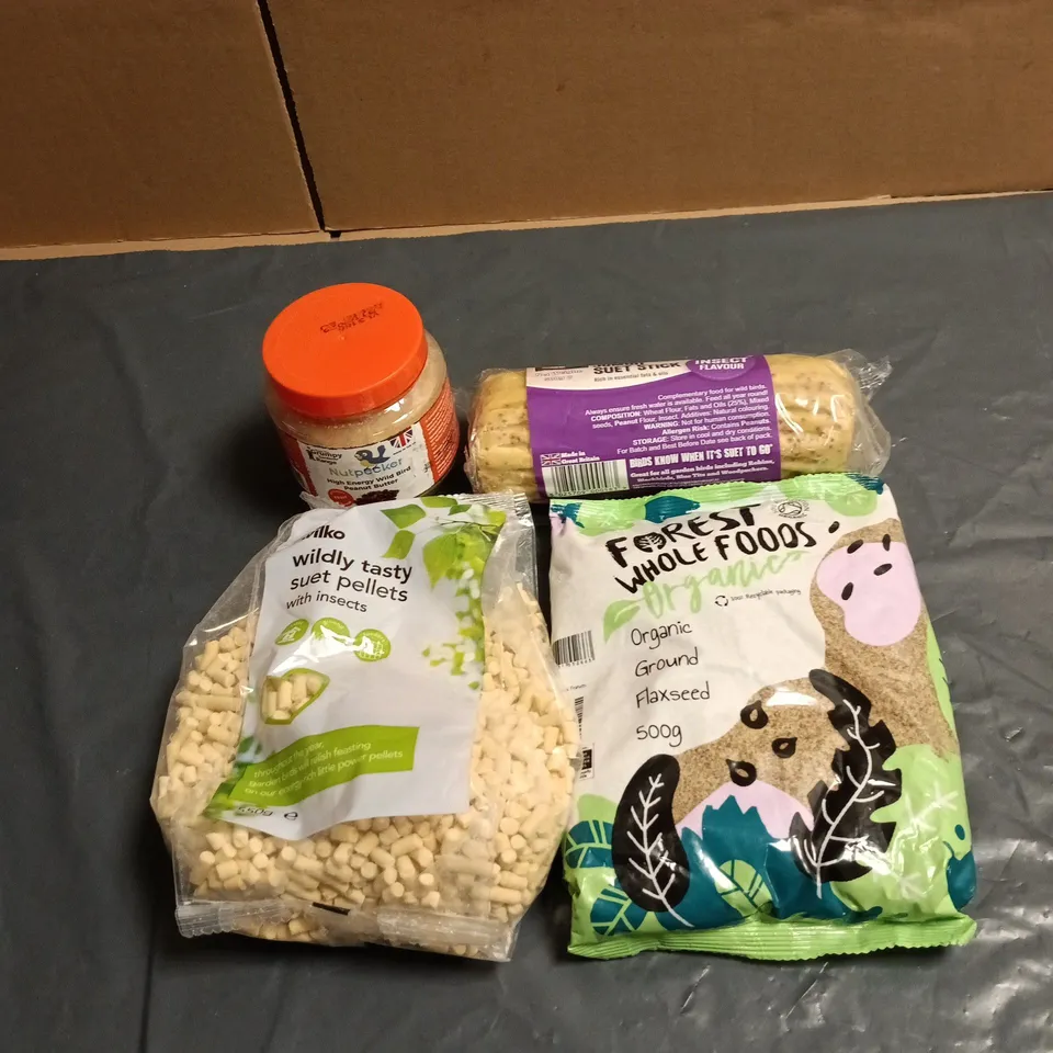 TOTE OF APPROXIMATELY 8 ASSORTED PET FOOD ITEMS TO INCLUDE FOREST WHOLE FOODS GROUND FLAXSEED, SUPER PREMIUM JUMBO SUET STICK, NUT PECKER PEANUT BUTTER ETC FOR BIRDS