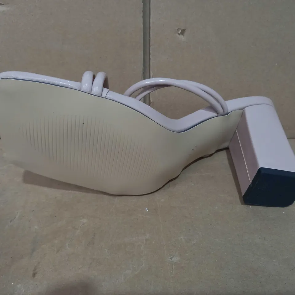 BOXED PAIR OF DESIGNER HEELS IN NUDE COLOUR EU SIZE 37