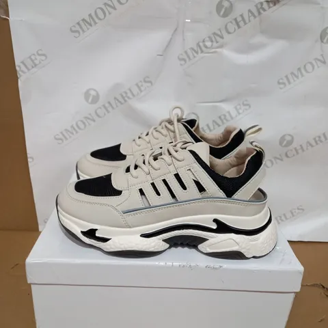 BOXED PAIR OF CUT OUT CHUNKY TRAINERS SIZE 39