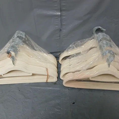 7 PACKS OF BEIGE HANGERS 