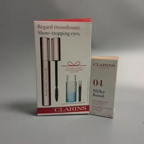 2 ASSORTED CLARINS BEAUTY PRODUCTS TO INCLUDE #04 MILKY BOOST 30ML AND SHOW-STOPPING EYES GIFT SET