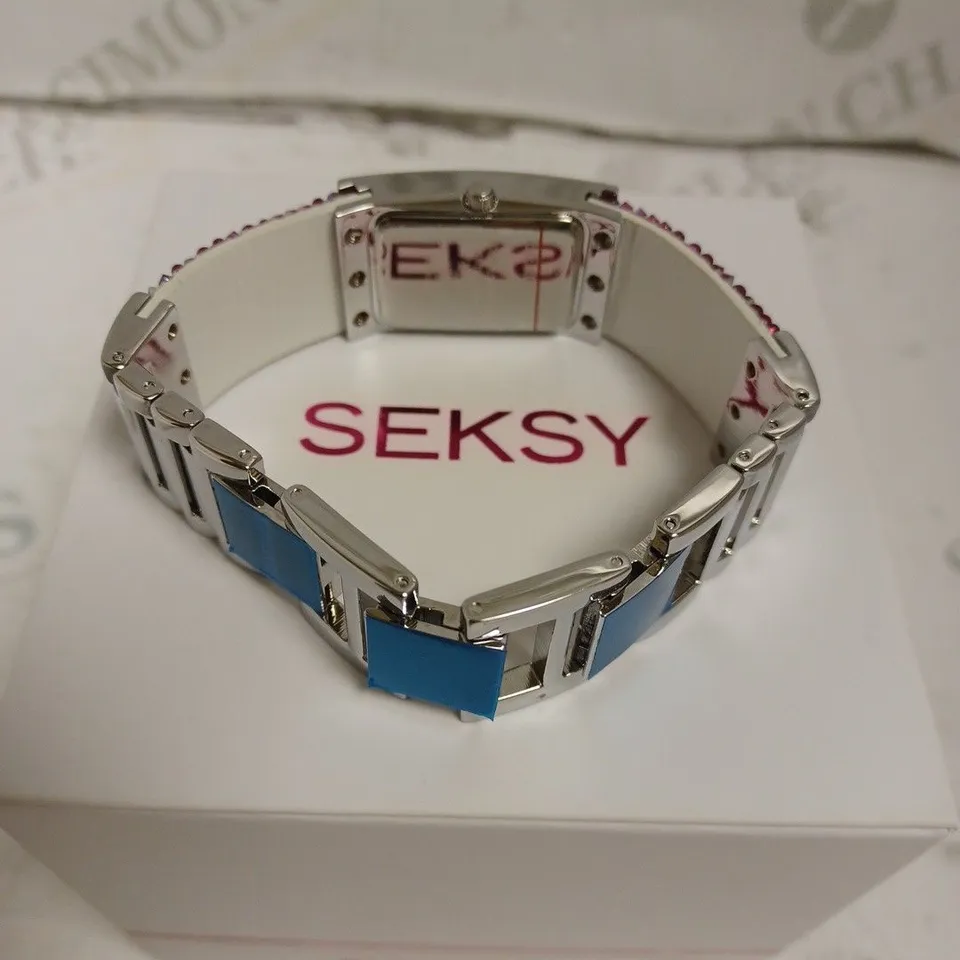 BOXED SEKSY BY SEKONDA LADIES STONE SET WATCH WITH STAINLESS STEEL BACK - JAPAN MOVEMENT. 