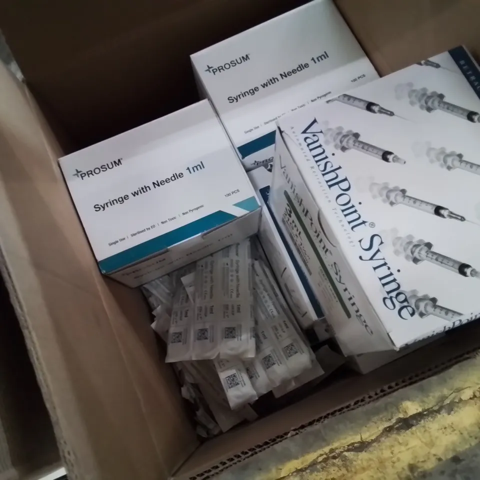 THREE CASES OF ASSORTED SYRINGES