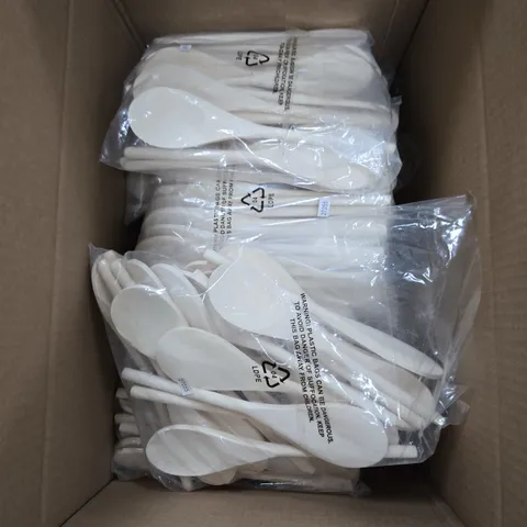 A BOX OF APROXIMATELY 12 PACKS OF  WHITE  WOODEN SPOONS