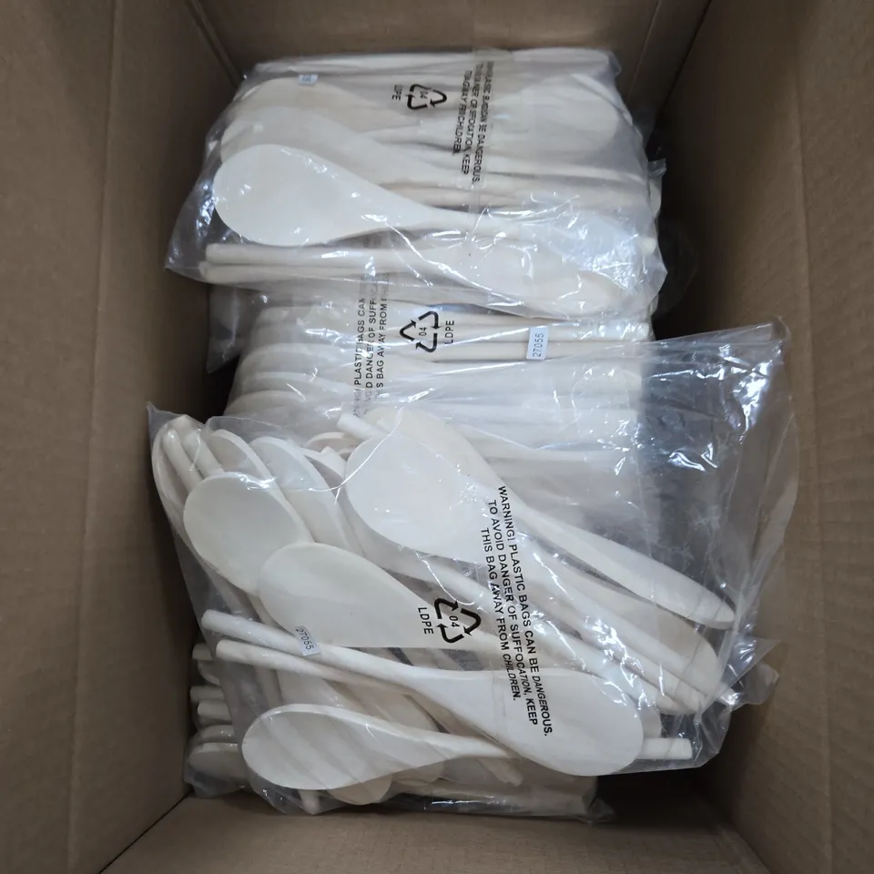 A BOX OF APROXIMATELY 12 PACKS OF  WHITE  WOODEN SPOONS
