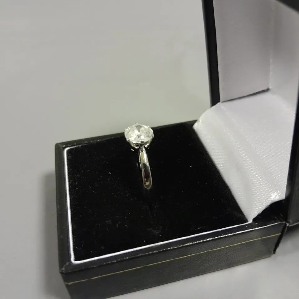 18CT GOLD SOLITAIRE RING SET WITH A NATURAL DIAMOND WEIGHING +-1.23CT