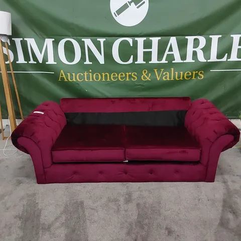 DESIGNER SOFA UPHOLSTERED IN BURGUNDY FABRIC