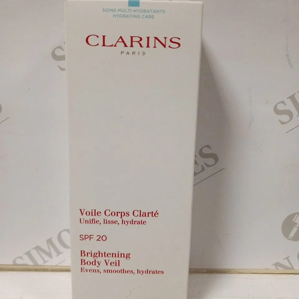 APPROXIMATELY 8 BOXED CLARINS PARIS BRIGHTENING BODY VEIL 200ML