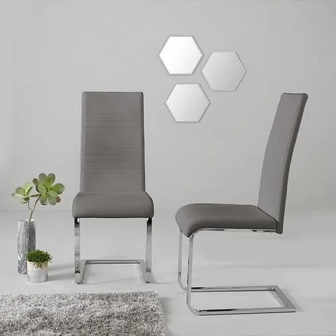 BOXED PAIR OF JET FAUX LEATHER CANTILEVER CHAIRS - MID GREY