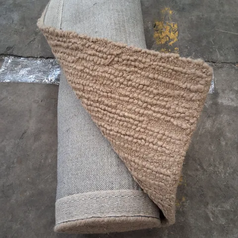 LARGE ROLLED TEXTURED RUG IN NATURAL 