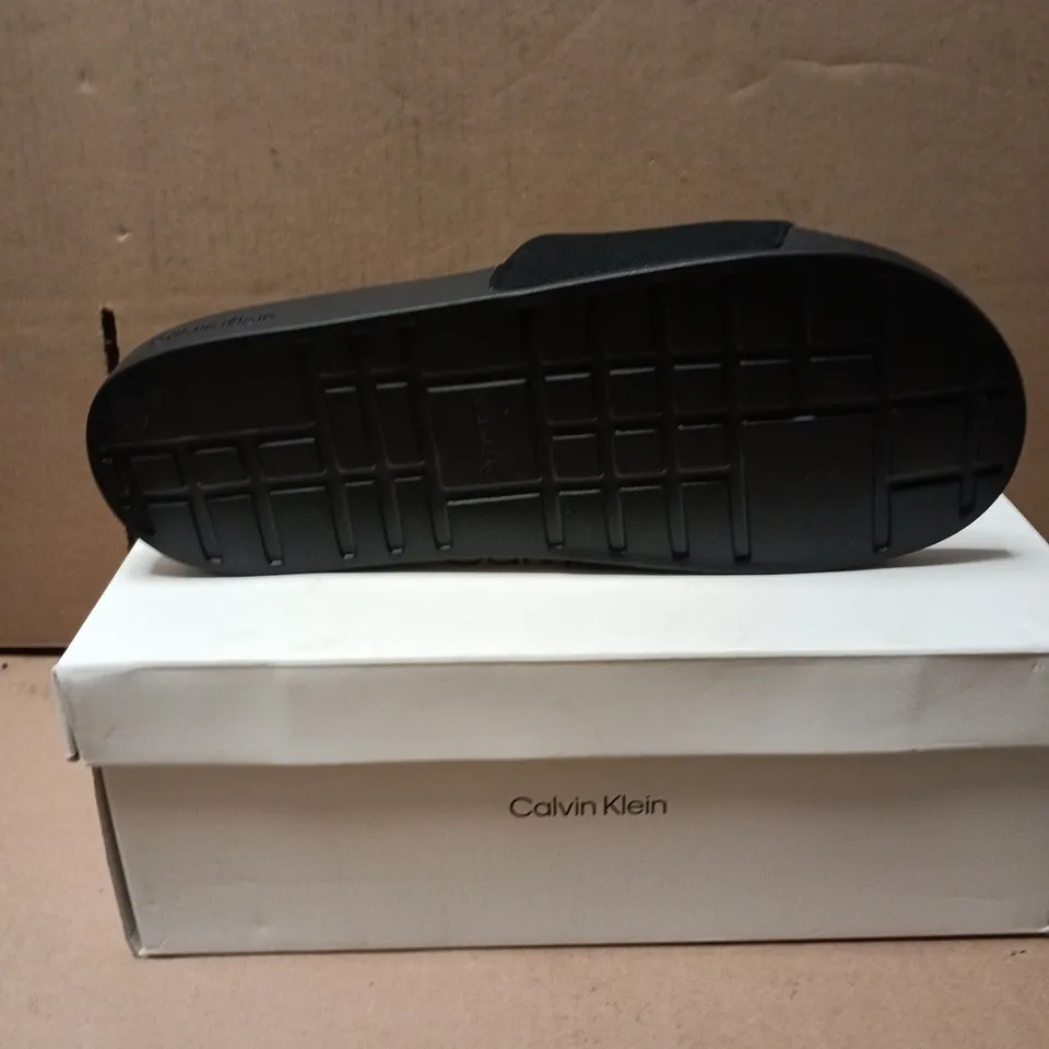 CALVIN KLEIN TRIPLE BLACK SLIDE SANDALS – MEN’S UK 9 (EU 43)