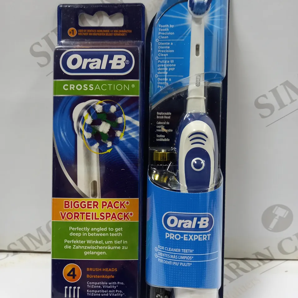 ORALB PRO EXPERT ELECTRIC TOOTHBRUSH AND ORALB CROSS ACTION SPARE HEADS