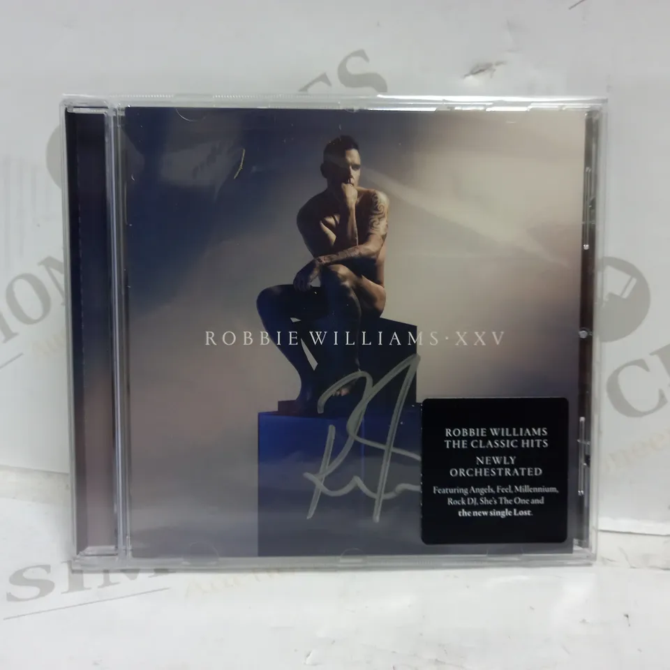 ROBBIE WILLIAMS XXV SIGNED ALBUM