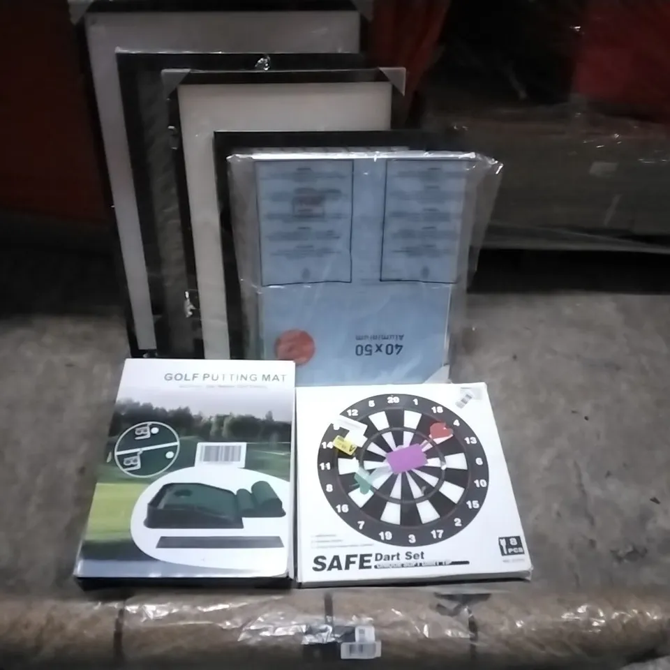 PALLET OF HOUSEHOLD ITEMS TO INCLUDE PICTURE FRAMES, GOLF PUTTING MAT, SAFE DARTS,RUG AND OTHER ASSORTED ITEMS...