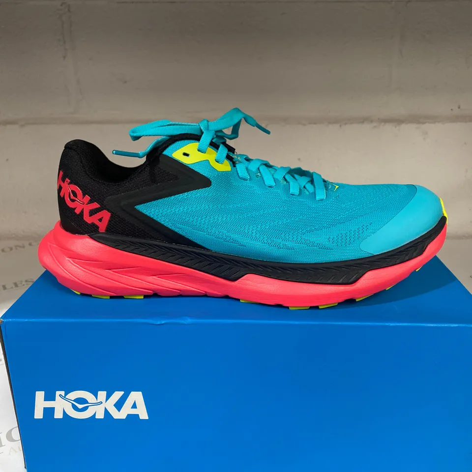 BOXED PAIR OF HOKA TEAL TRAINERS SIZE 7.5