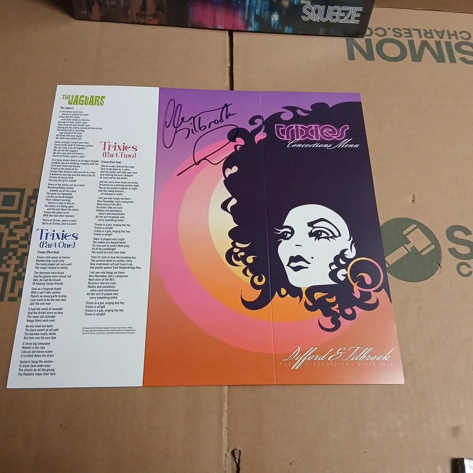 SQUEEZE – TRIXIES ALBUM BUNDLE TO INCLUDE; TRANSPARENT PINK VINYL, 2CD + BLU-RAY, TRIXIES SINGLE ON VINYL, GLEN TILBROOK SIGNED TRIXIES CONCOCTIONS MENU MERCHANDISE