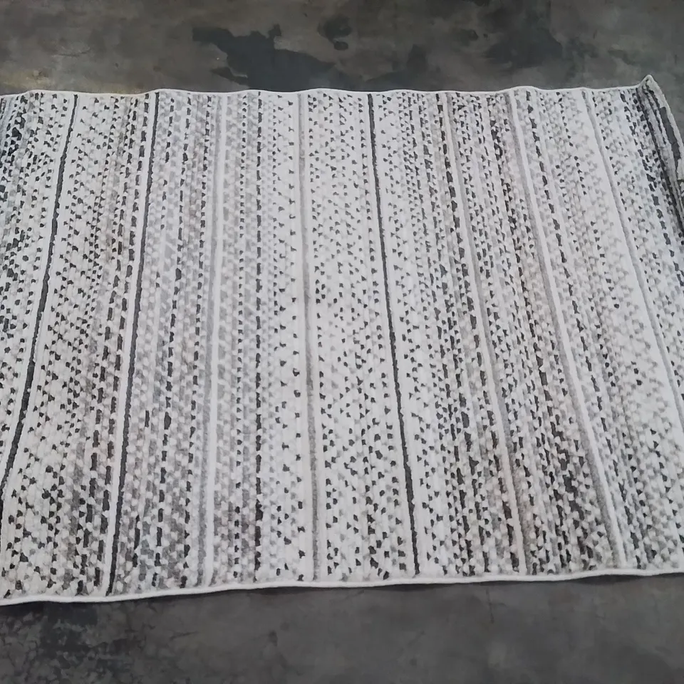 STILLAGE OF APPROXIMATELY 20 QUALITY DESIGNER RUGS
