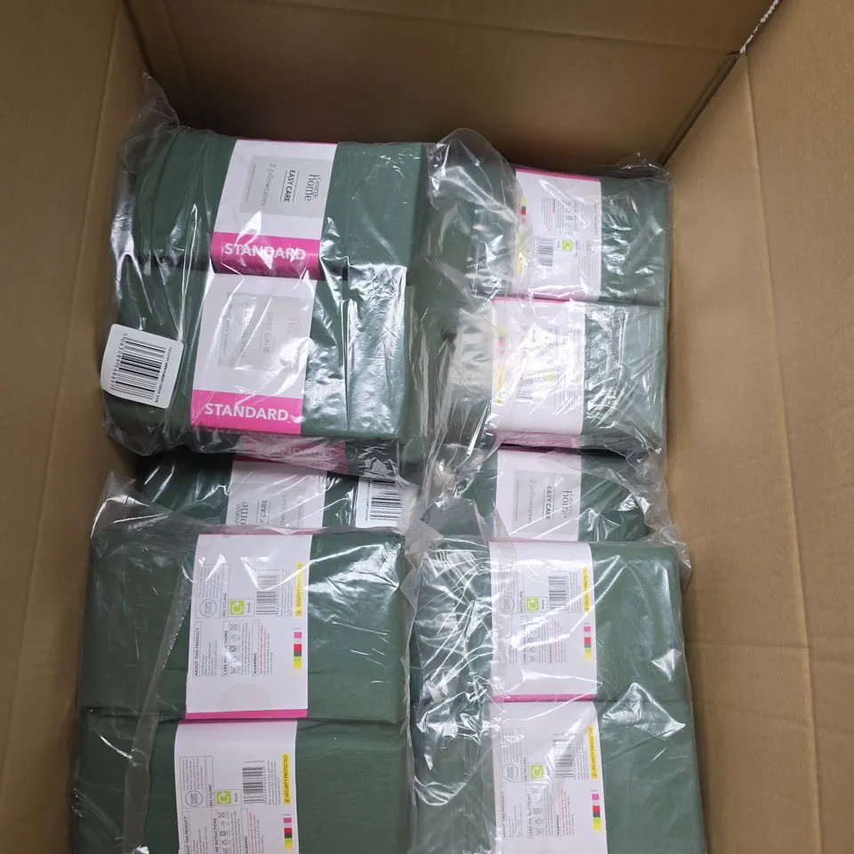 LARGE BOX OF APROX 100 ASSORTED EASY CARE PILLOW CASES 