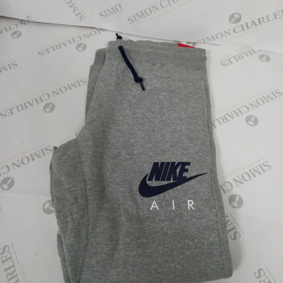 NIKE AIR TRACKSUIT BOTTOMS SIZE M