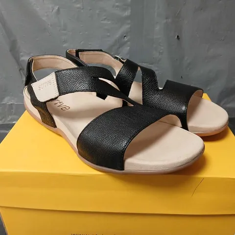 BOXED PAIR OF STRIVE JINNY SANDALS IN BLACK - SIZE 7