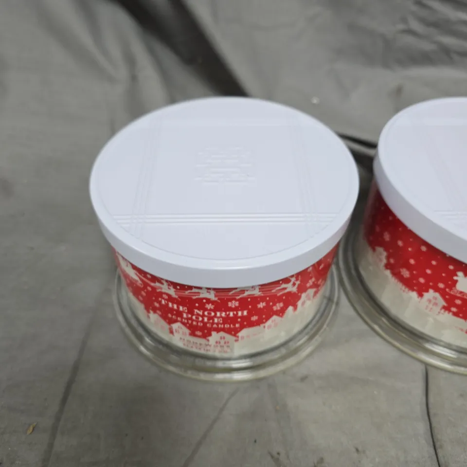 THE NORTH POLE SCENTED CANDLES – PAIR IN GLASS JARS WITH WHITE LIDS HOMEWORX BY SLATKIN + CO. SET OF 2 18OZ. THE NORTH POLE 4 WICK CANDLES