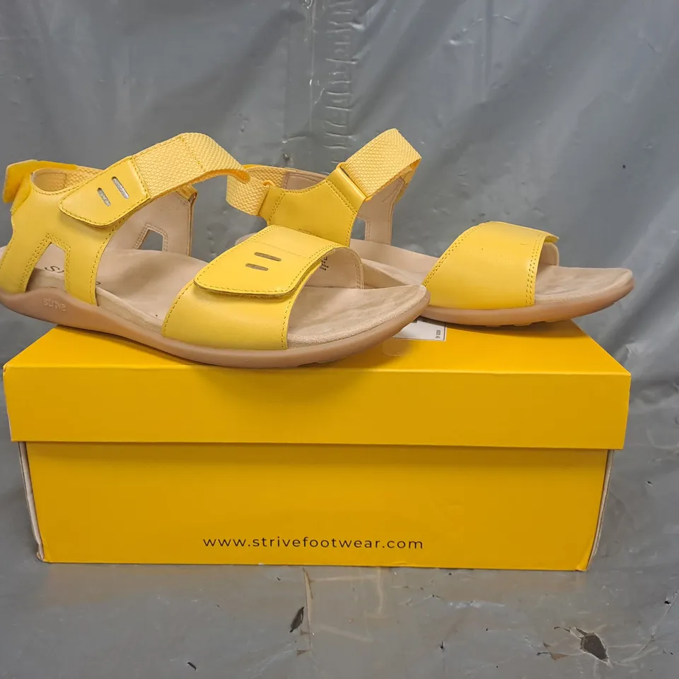 BOXED PAIR OF STRIVE FLOAT SANDALS IN YELLOW SIZE 7