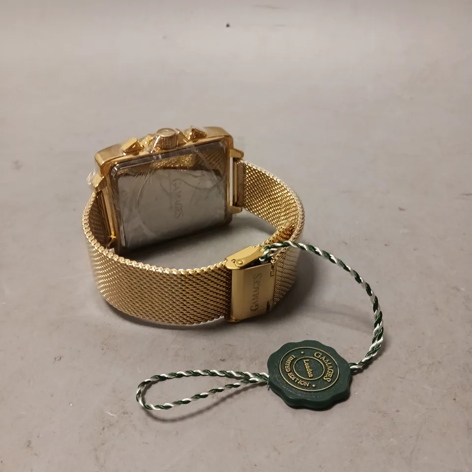 GAMAGES EXCLUSIVE NAVY DIAL GOLD COLOUR CASE WATCH