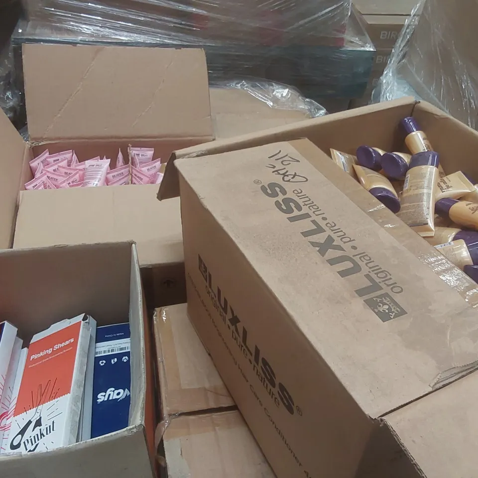 PALLET CONTAINING A VERY LARGE QUANTITY OF ASSORTED BEAUTY RELATED PRODUCTS INCLUDING: ARGAN OIL & MARULA CONDITIONER, PINKING SHEERS, BEAVER CHERRY BLOSSOM CONDITIONER ECT