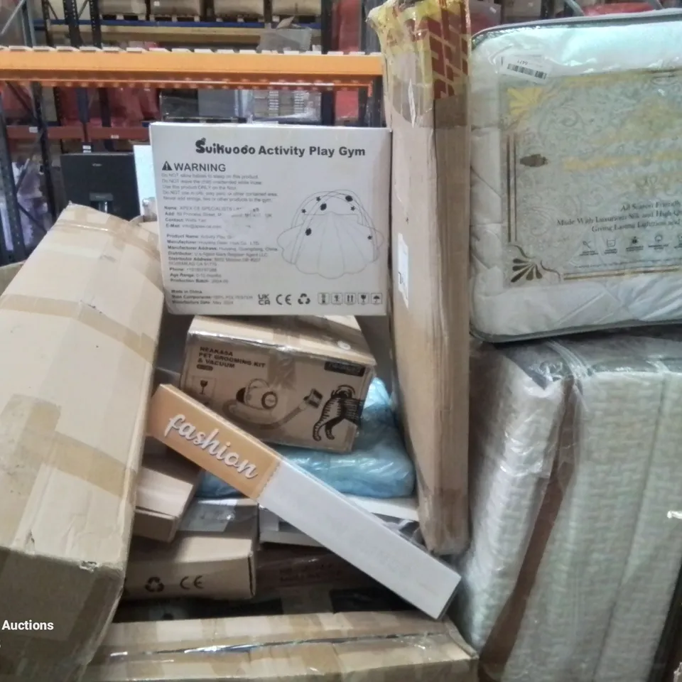 PALLET CONTAINING VARIOUS ASSORTED ITEMS TO INCLUDE: MULBERRY SILK DUVET, PET GROOMING KIT AND VACUUM,  ACTIVITY PLAY GYM AND LOTS MORE UNMARKED BOXED ITEMS 