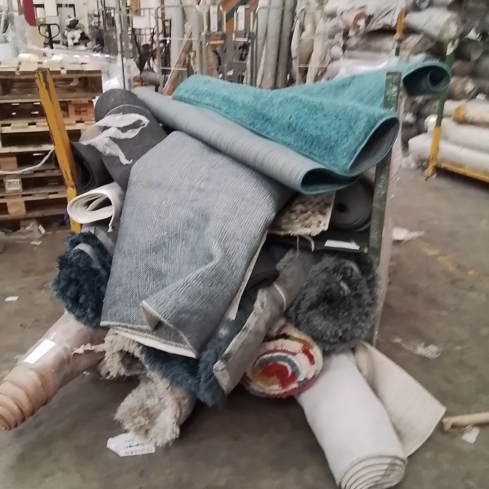 STILLAGE OF APPROXIMATELY 20 QUALITY DESIGNER RUGS