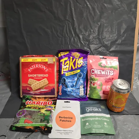 APPROXIMATELY 15 ASSORTED FOOD ITEMS TO INCLUDE LUCOZADE , TAKIS , CHEWITS , ETC 