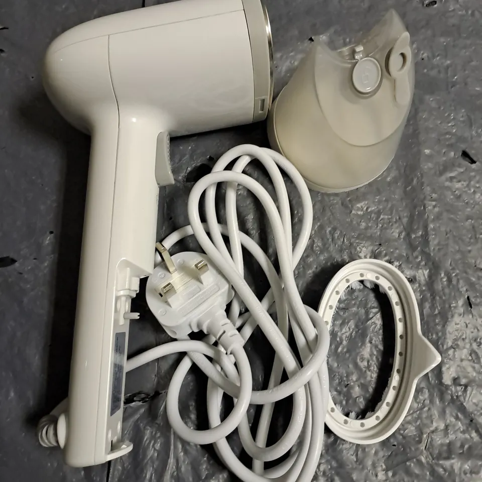 HAND-HELD CLOTHES STEAMER