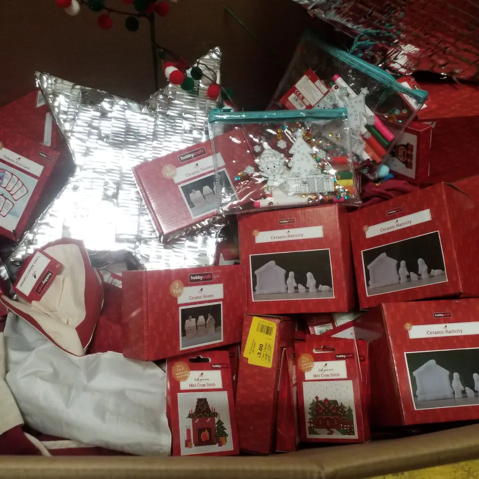 PALLET CONTAINING ASSORTED CHRISTMAS PRODUCTS & DECORATIONS INCLUDING CERAMIC HOUSES, STAR PINATA, CHRISTMAS TRIVIA CARDS, MINI CROSS STITCHES & DYE PENCIL CASES